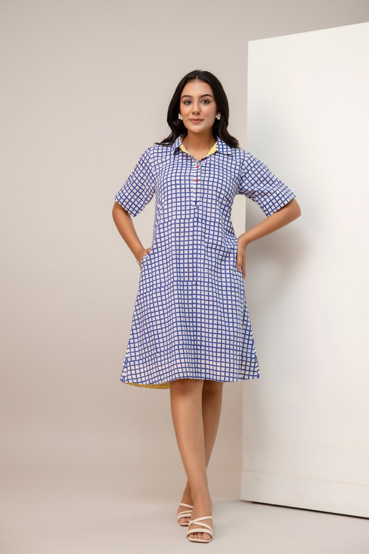 Elbow sleeve with yellow inner facing on blue check cotton dress