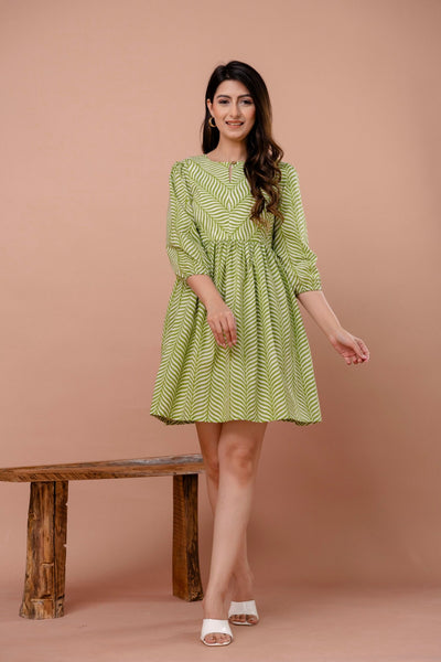 Green cotton dress with white leaf hand block print on neck yoke