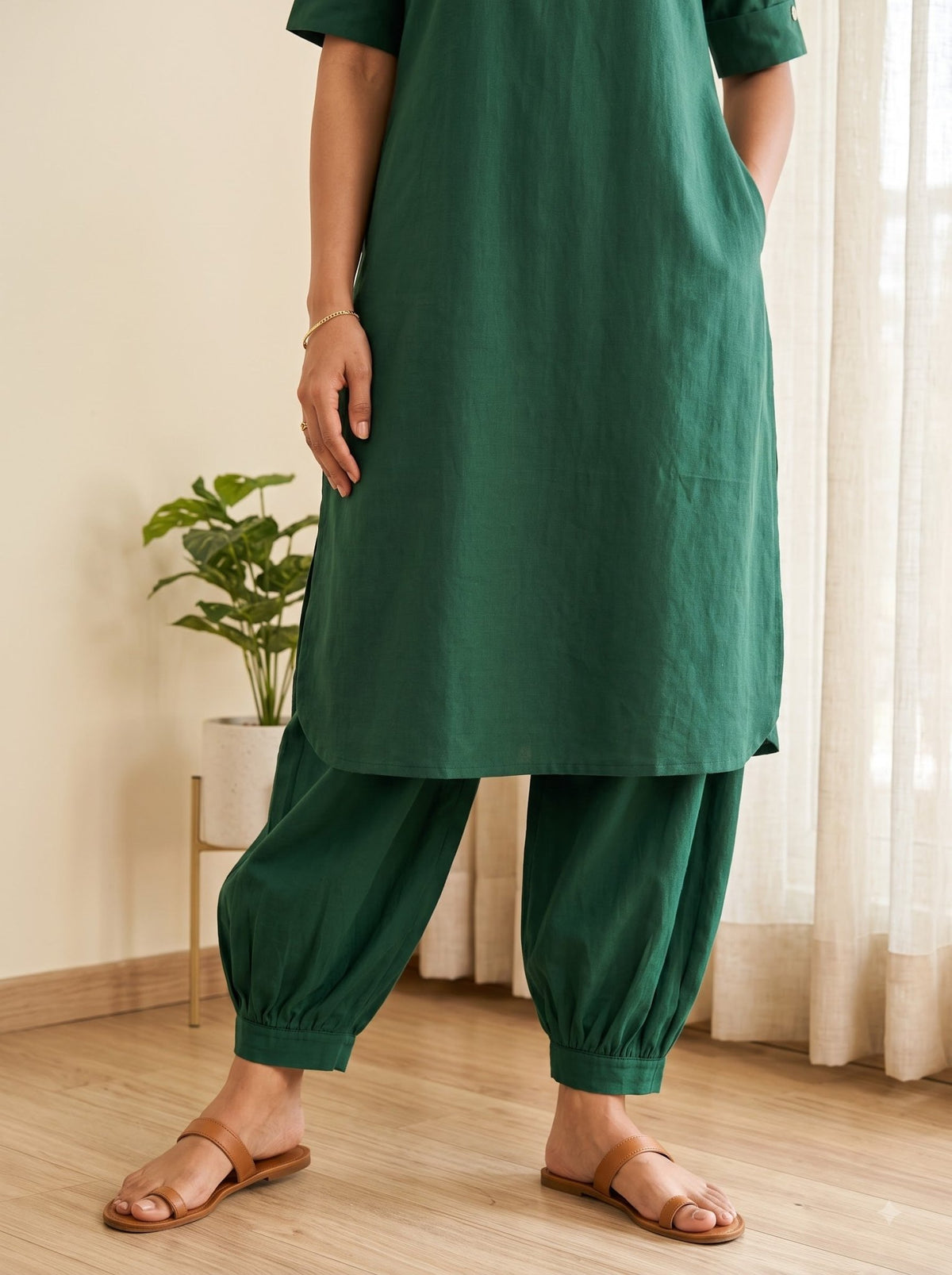 Pleated hem detail on bottle green cotton co-ord pant