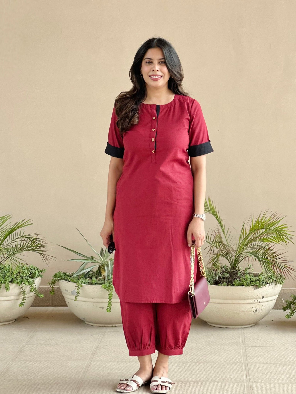 Pleated hem detail on maroon cotton co-ord pant